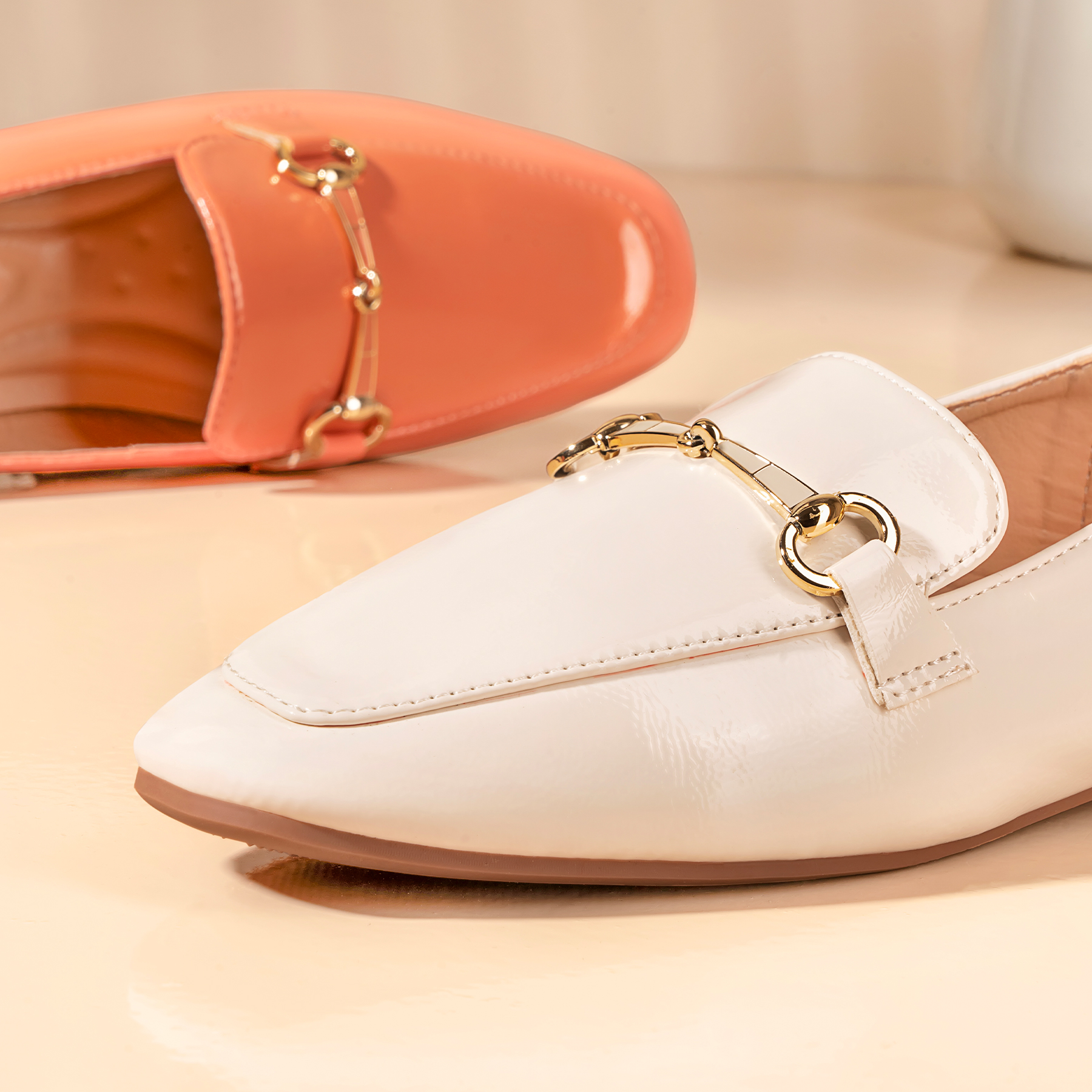 White loafers with gold buckle discount